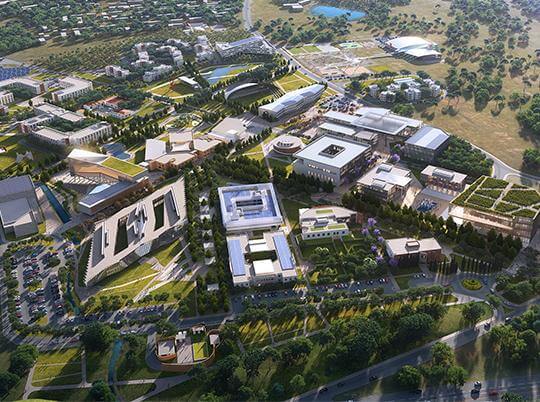 Aerial view of Cyprus International University campus in North Cyprus, showcasing modern academic buildings, green areas, and advanced facilities.